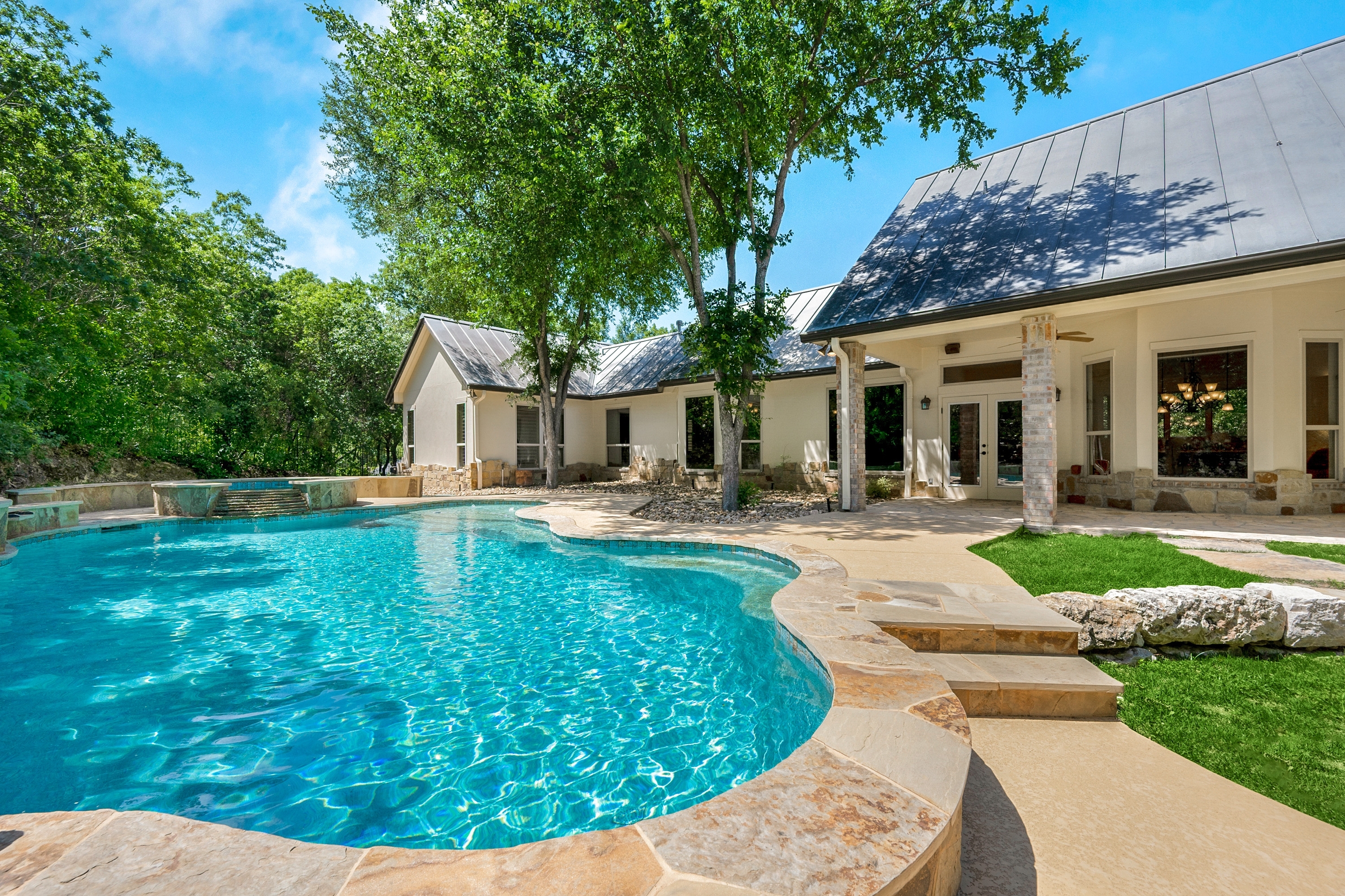 Luxurious swimming pool maintained by Texas Pool Services in Austin