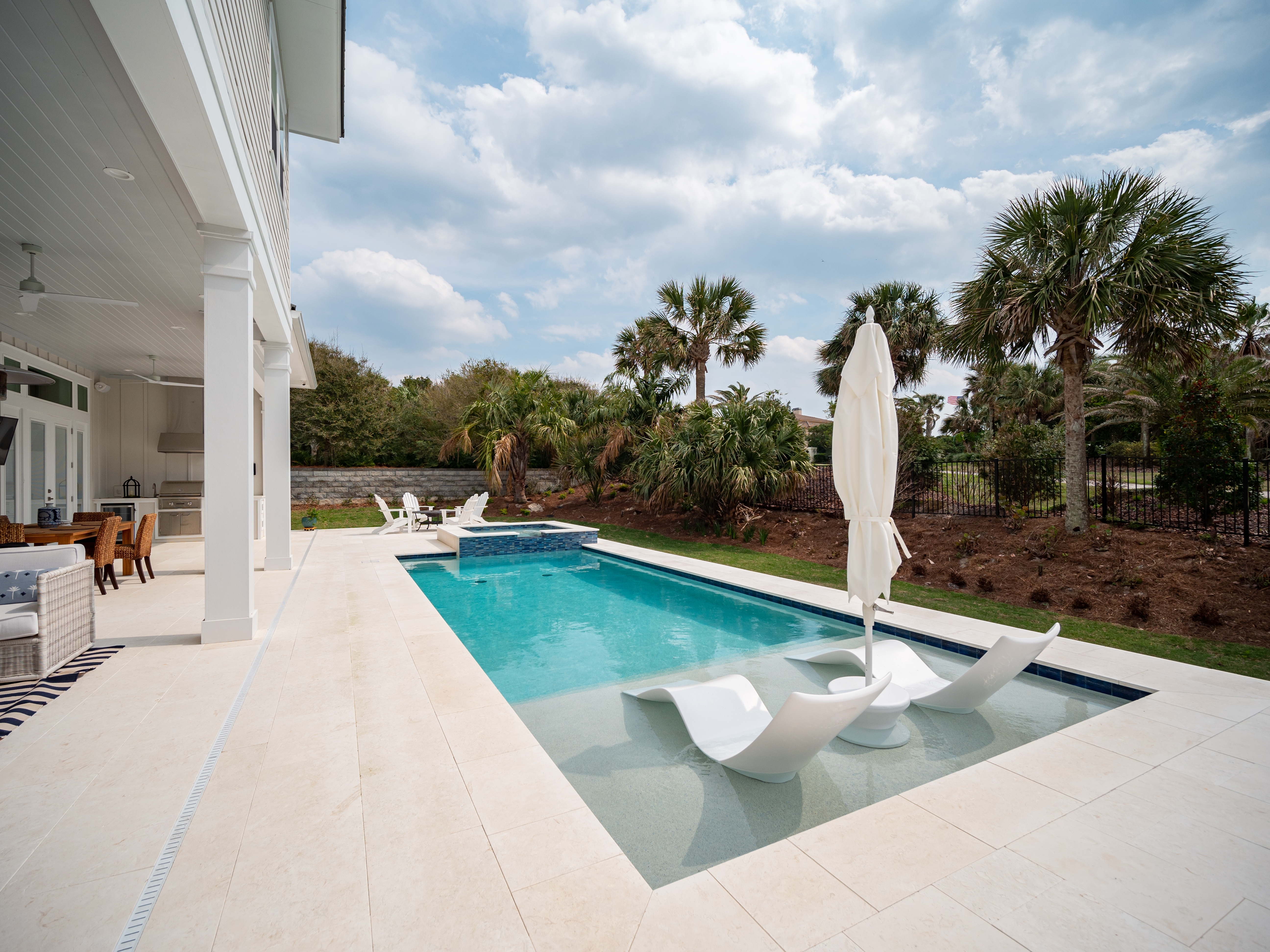 Modern infinity pool overlooking nature's beauty